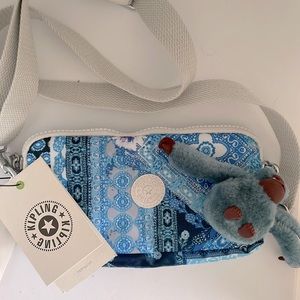 Kipling Small Handbag:New Blue and White smaller bag with white canvas strap.